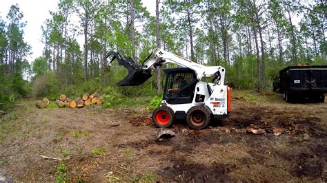 loading logs with skid steer|How to Move Logs with a Skid Steer Cat 259D .